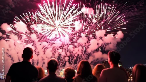 Dazzling Fireworks Over City Skyline at Nighttime Celebration Event
