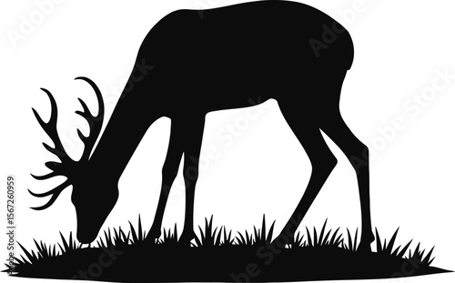 Majestic deer silhouette grazing in grassland