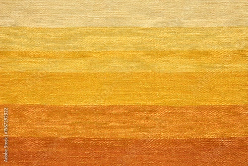 A close-up shot of an abstract pattern with horizontal color stripes. It showcase the warm shades of yellows and oranges