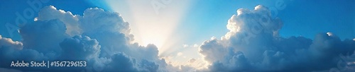 Majestic Sun Rays Burst Through Dramatic Clouds, Revealing Vibrant Blue Sky ? Breathtaking Celestial Scene Perfect for Inspirational Backgrounds and Nature Projects
