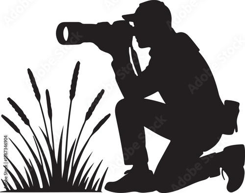 Wildlife Photographer Kneeling in Grass Silhouette