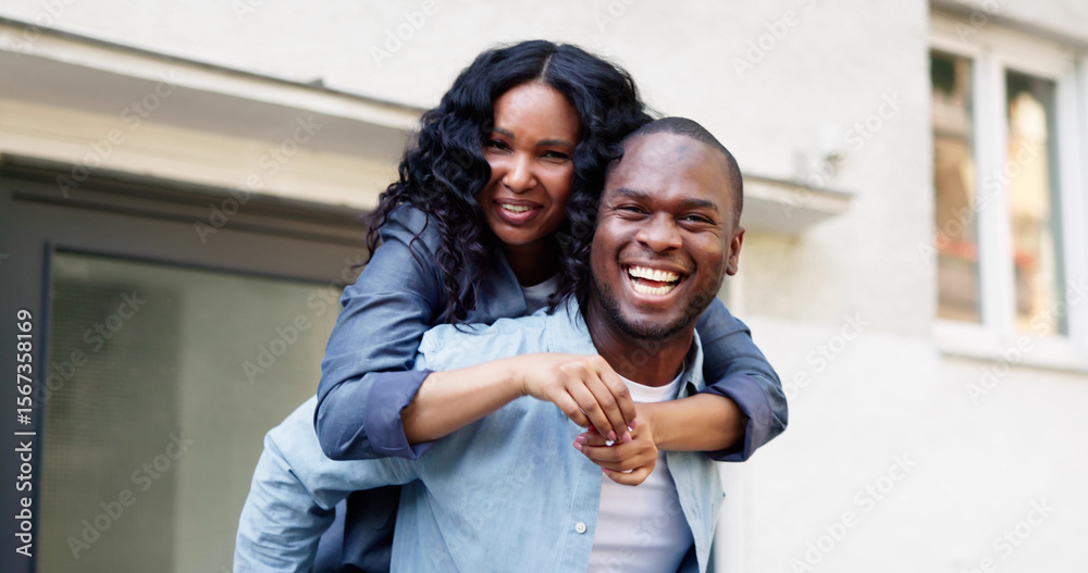 Fototapeta premium Young Couple Celebrates Buying New House With Keys