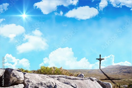 Cross religion symbol shape over blue sky