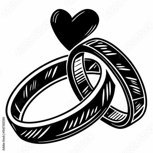 Interlocking wedding rings with a heart symbol above