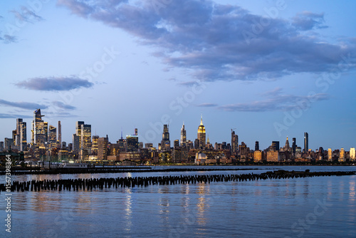 New York city. NYC cityscape. Manhattan and WTC in New York Cit. Skyscrapers of Manhattan near rippling water of New York bay. New York skyscrapers. Brooklyn district. NY city.