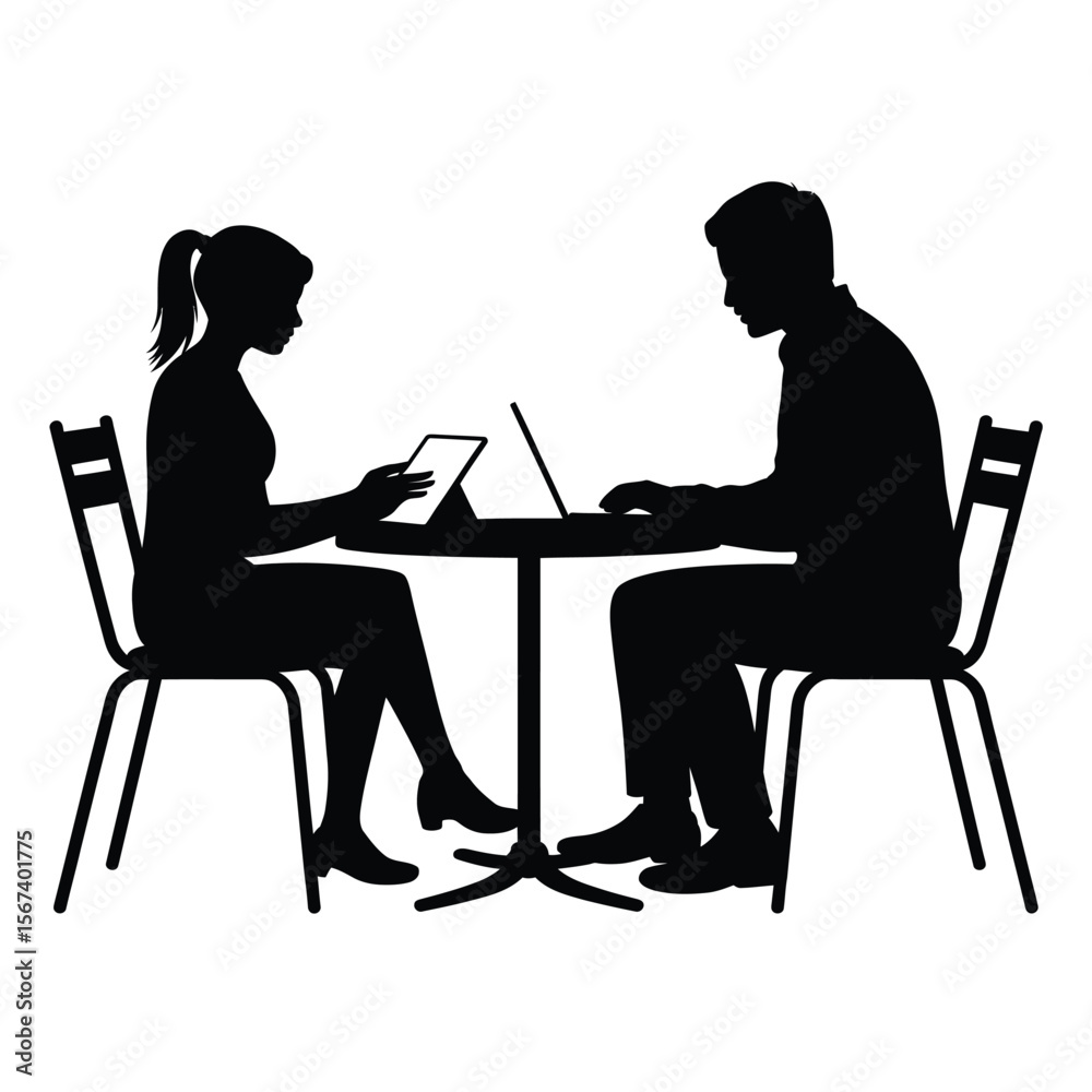 Silhouette of a man and woman working together on a laptop and tablet at a table Silhouette of a man and woman working together on a laptop and tablet at a table