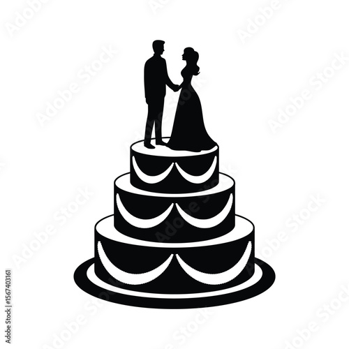 Elegant silhouette of a bride and groom on a three tier wedding cake