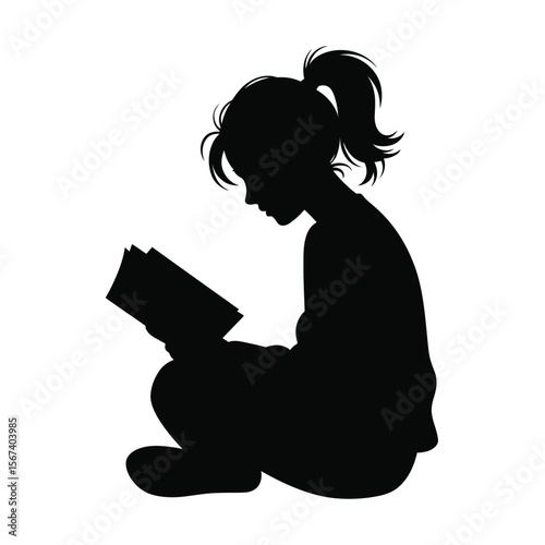 Silhouette of a young girl with a ponytail reading a book while sitting