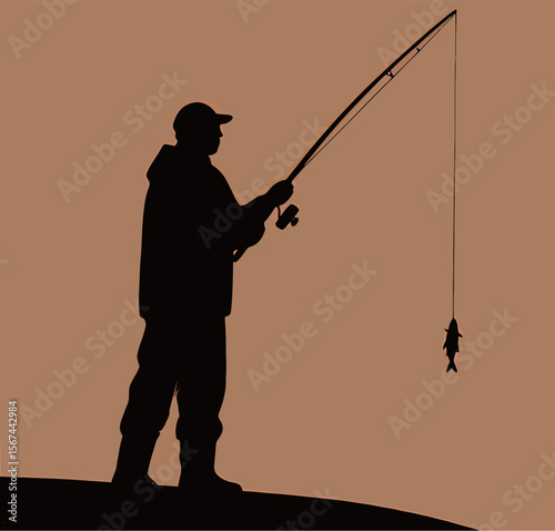 Silhouette of a male angler proudly reeling in a fish during sunset.