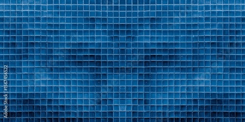 Dark blue ceramic tile wall for abstract seamless background and texture.