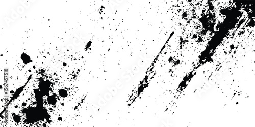 Abstract ink splatter background with black and white textures. A dynamic and chaotic effect, movement with different sizes of spots, splashes, drips, drops and smudges. Isolated on white background. 