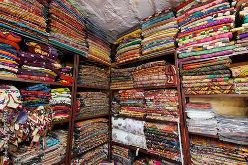 colorful textiles for sale in the textile shop Jaisalmer, India