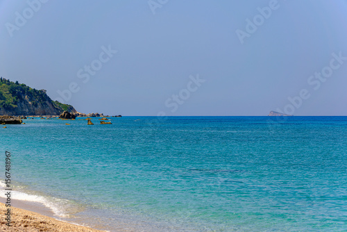 Fototapeta Naklejka Na Ścianę i Meble -  Azure and Turquoise Hues of the Ionian Sea from Kathisma Beach