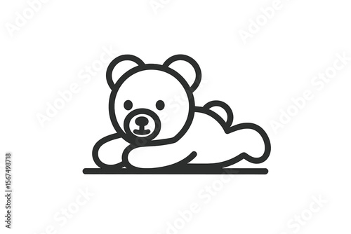 Cute teddy bear lying down with a playful expression on a simple background