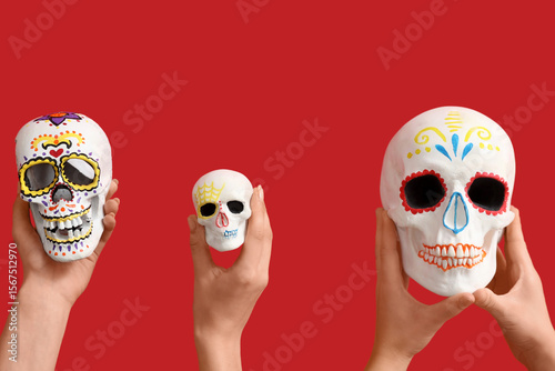 Female hands holding painte...