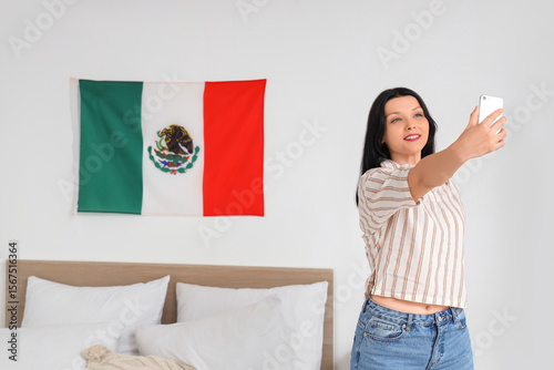 Young Mexican woman taking ...