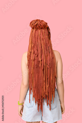 Young woman with dreadlocks...
