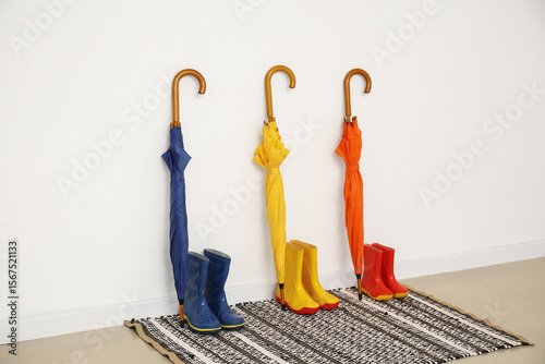 Colorful umbrellas and rubb...