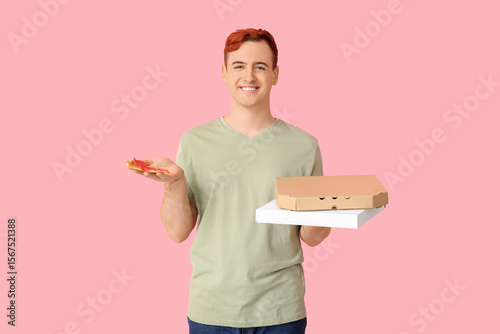 Young man holding cardboard...