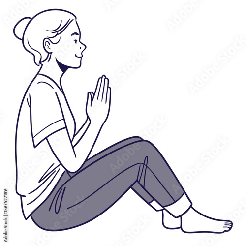 Woman sitting with hands clasped in prayer praying meditation