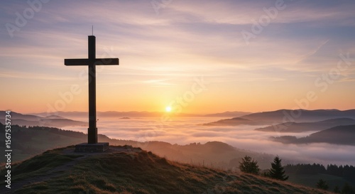 Sunrise over mountaintop cross (1)