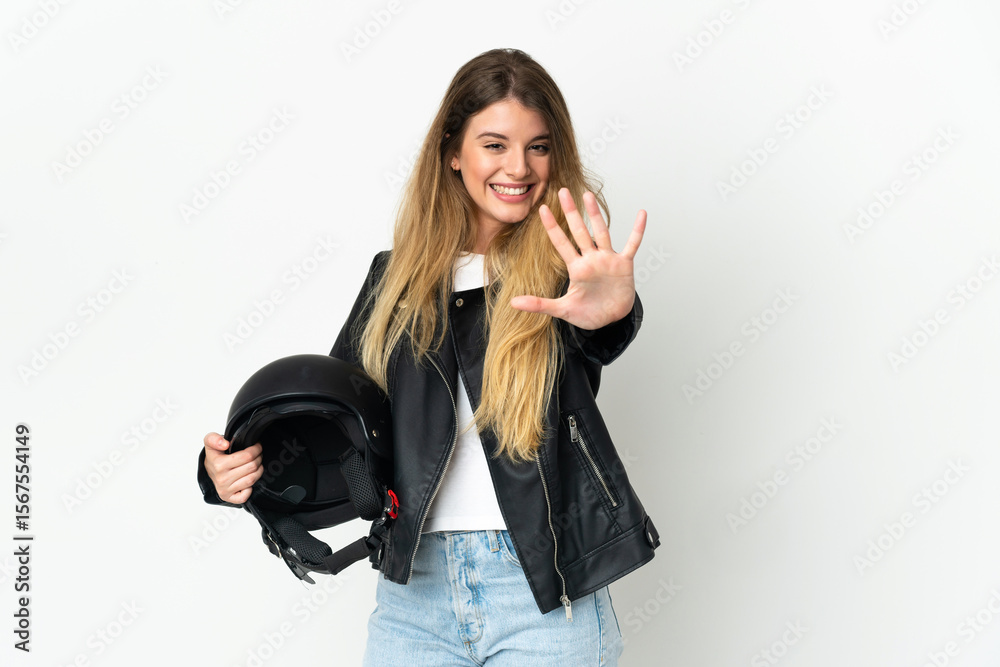 Fototapeta premium Woman holding a motorcycle helmet isolated on white background counting five with fingers