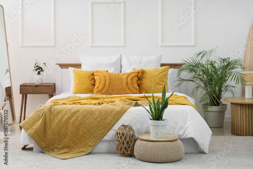 Interior of light bedroom w...