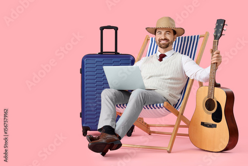 Businessman with laptop and...