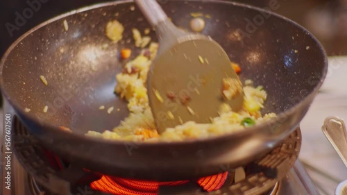 Fried Rice Stir Fry on Hot Stove � Asian Street Food Cooking Close-Up