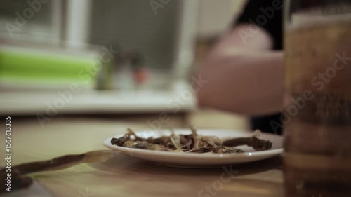 Enjoying Cured Fish with a Bottle of Beer — Casual Snack and Beverage Pairing