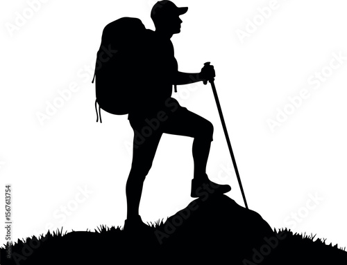 Silhouette of a Hiker with Backpack and Pole on a Mountaintop.