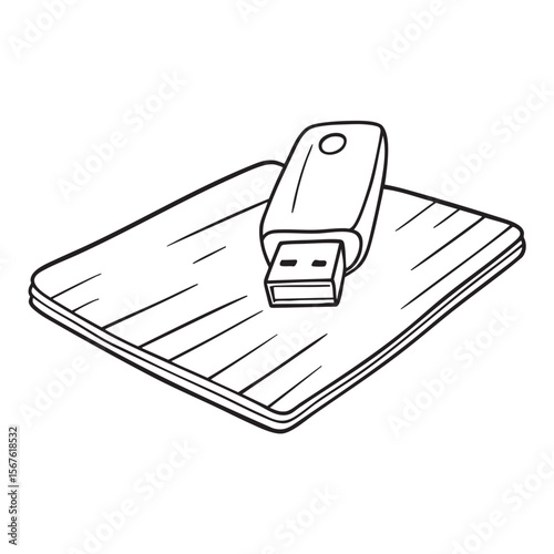 A desktop mat near a resting USB stick