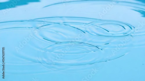 Calm Blue Water Surface with Ripples – Clean Liquid Texture Background for Spa or Nature Theme