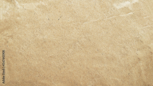 Abstract brown recycled paper background.
Old Kraft paper texture box craft pattern.
top view.