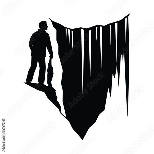 Man standing beside icy cliff with icicles silhouette