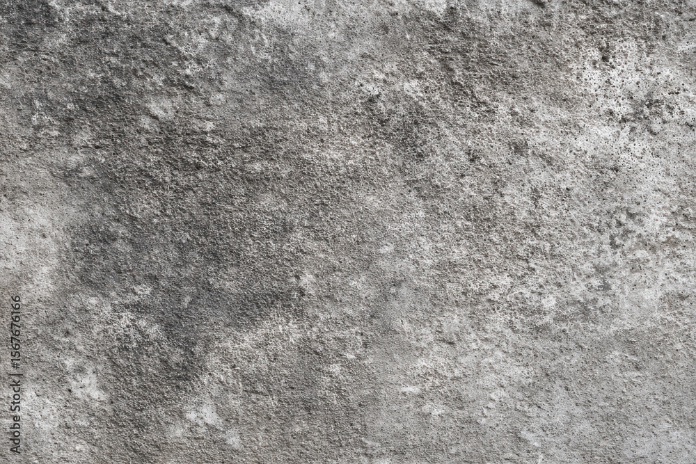 Fototapeta premium Rugged gray concrete texture perfect for urban-themed designs and industrial backgrounds in modern creative projects
