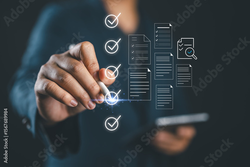 Checklist business performance monitoring concept, Businessman using tablet online survey filling out check digital form task, survey question form, target marketing planning with quality control