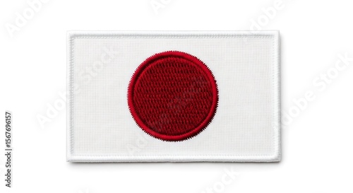 Embroidered Japanese Flag Patch: Detailed Texture Isolated on White Close-up.