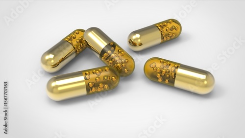 3d golden capsules render. Stock image.	