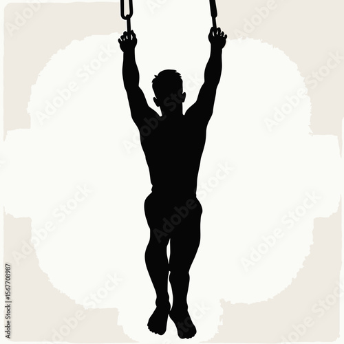 Silhouette of a man performing a gymnastic exercise with rings.