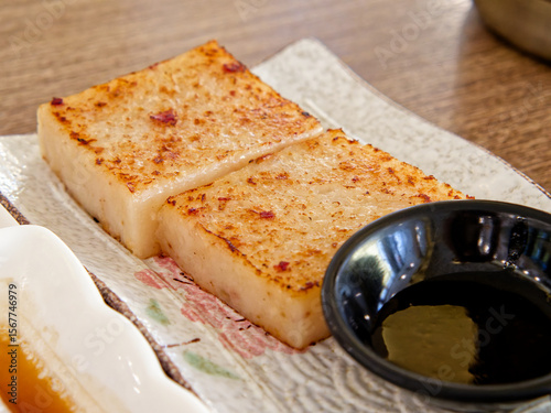 Pan-Fried Turnip Cake. Crispy edge, soft savory radish cubes