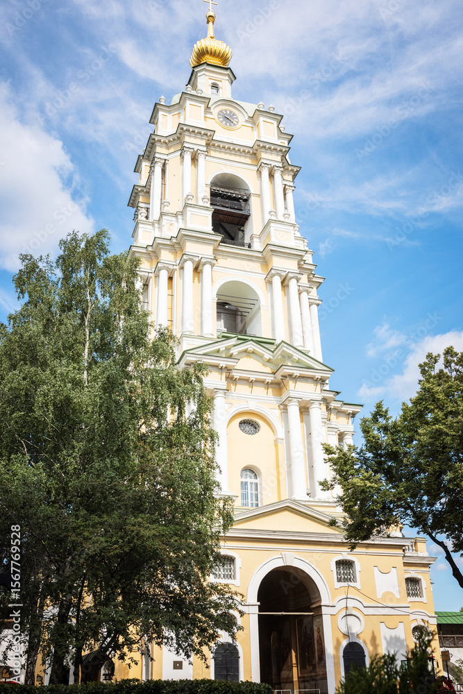 Fototapeta premium Church of St. Sergius of Radonezh in Novospassky Monastery on a summer day against the blue sky in Moscow