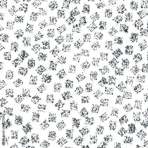 The texture consists of spots or dirty marks scattered across the canvas.