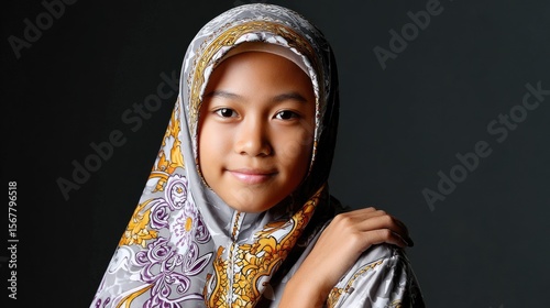 Young girl wearing patterned hijab portrait