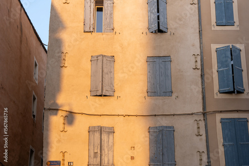 Old French House with Blue Wooden Shutters in Narbonne, France