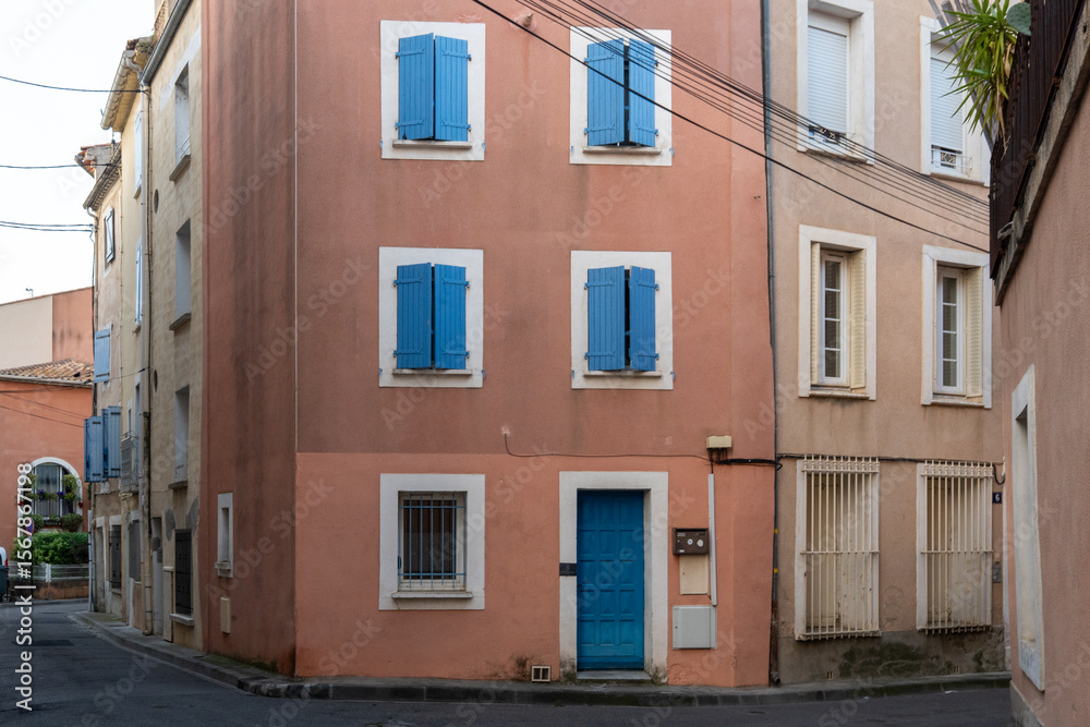 Fototapeta premium Colorful French Apartment Homes in Narrow Street, Narbonne, France