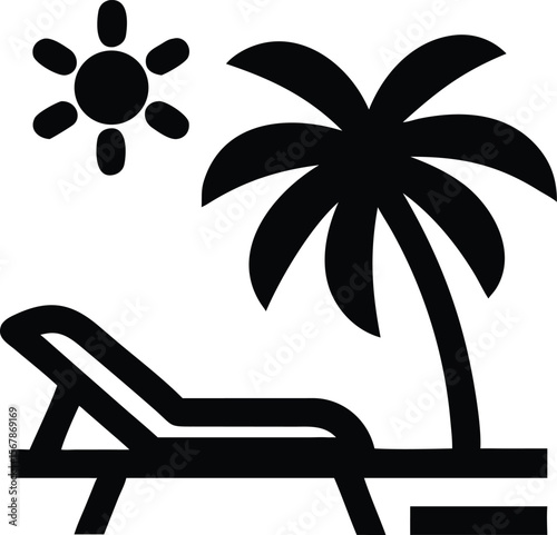 Beach lounger and palm tree on sand tropical