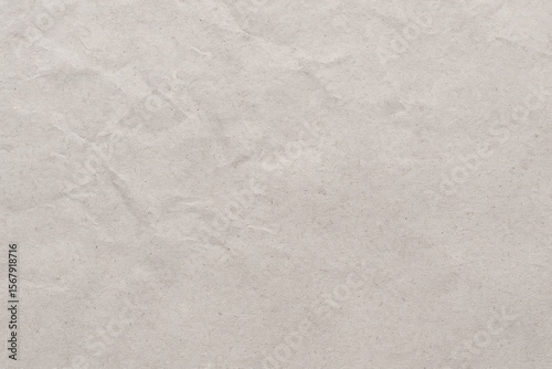 Background featuring recycled white craft paper with a vintage grey paper overlay, showcasing a textured, grunge-style design with creases and rough patterns, ideal for text placement.