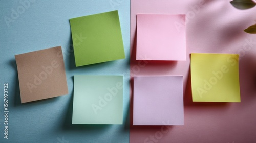 Creative brainstorming session with colorful sticky notes on pastel background office workspace minimalist aesthetic