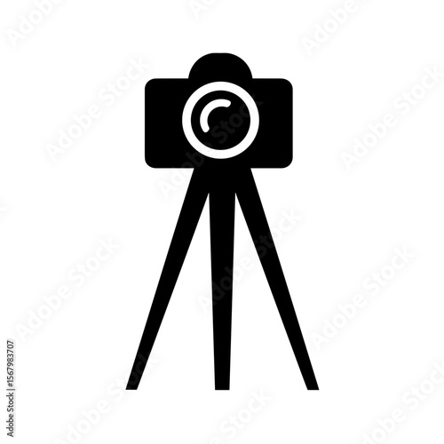 A simple black-and-white icon of a camera on a tripod against a plain white background; capturing stillness and creative potential.